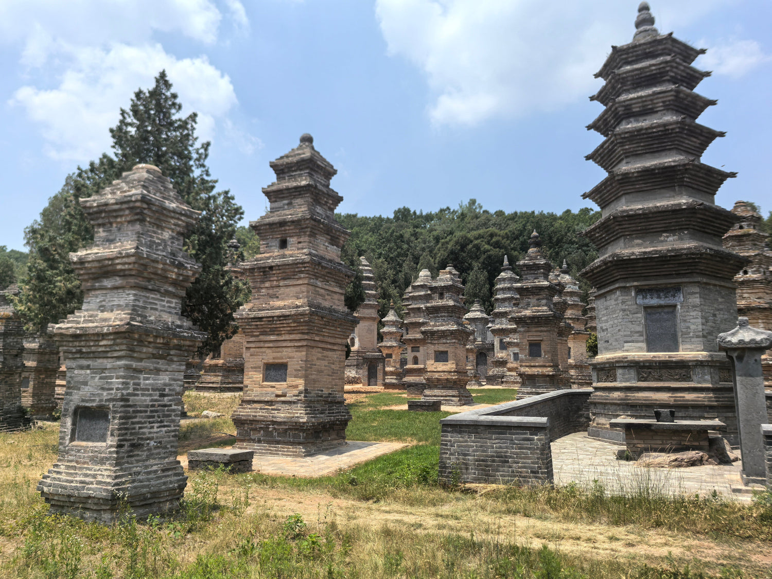 Ancient brick Buddhist pagodas in a peaceful outdoor Shaolin monastery setting