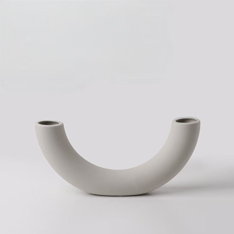 Minimalist gray ceramic incense holder with dual openings for meditation and altar decor