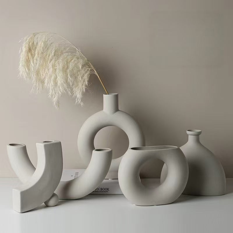 Minimalist ceramic vases with abstract shapes, ideal for altar decor or mindful home styling