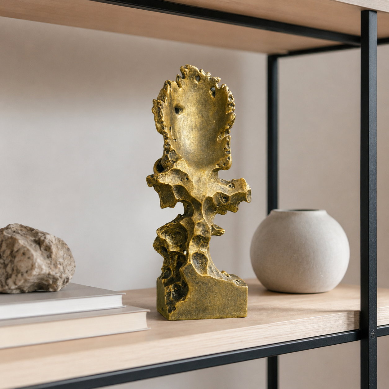 Harmony in Chaos: The Gold-Painted “Peace & Strength” Sandstone Sculpture