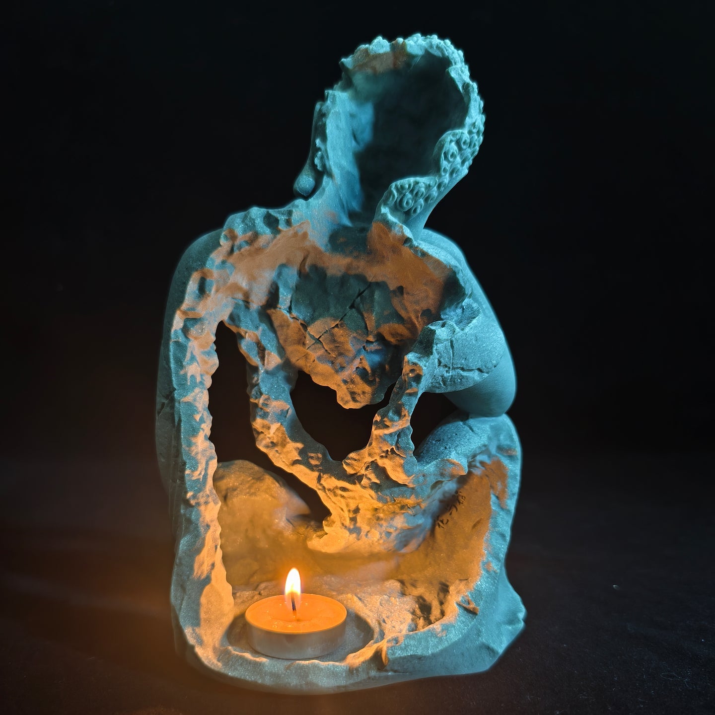 Modern Mindful Buddha Silhouette: Sandstone Sculpture & Ambient Candle Holder