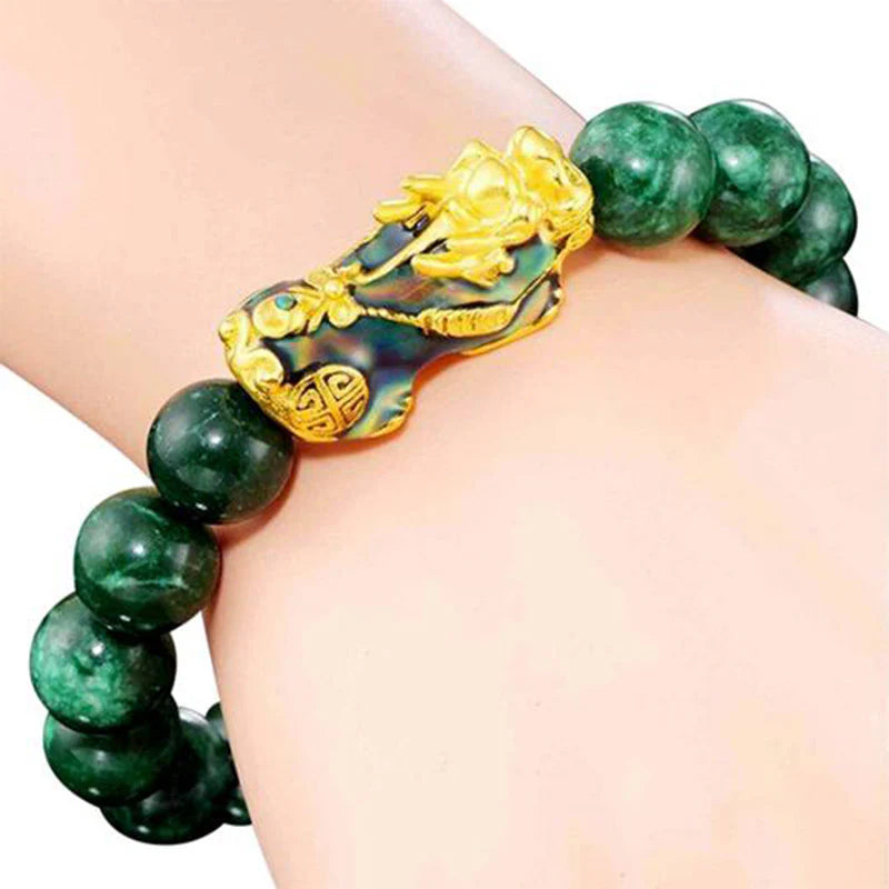 Green jade prayer beads with golden dragon charm for mindfulness and peace